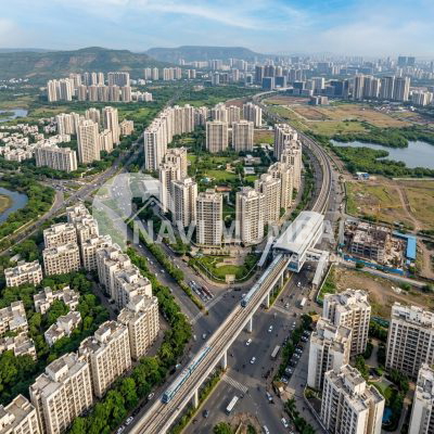 Young buyers comparing properties in Navi Mumbai